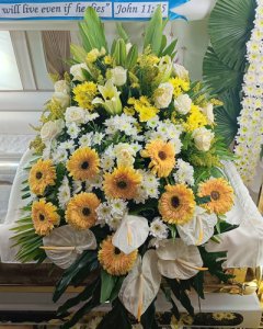 Gerbera,Lilies,Roses and anthoriums casket